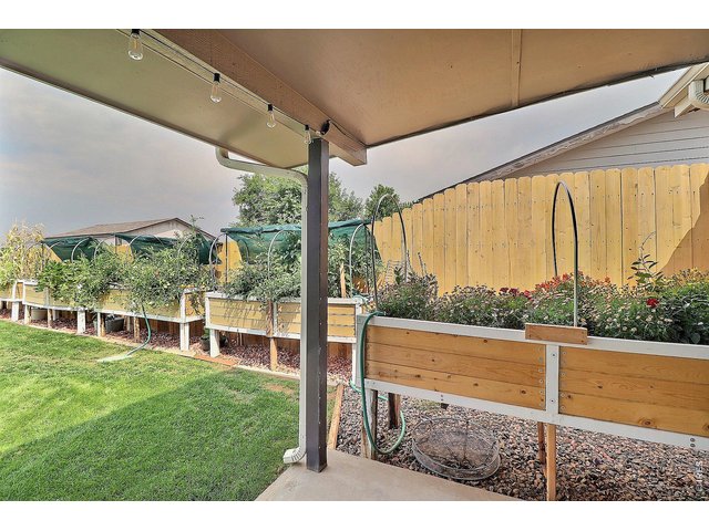 Property Photo 44 Look At These Raised Planters! Fully In Bloom!