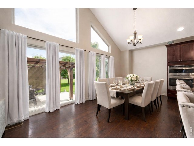 Property Photo 7 Great Room Opens to Kitchen & Kitchen Eating Area