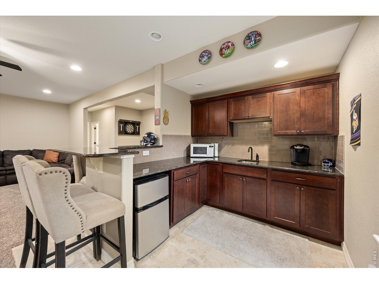 Property Photo 26 Basement Bar Includes Beverage Fridge, Sink & Microwave!