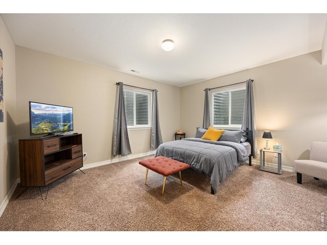Property Photo 28 4th Bedroom- Located in Basement is Large! Includes a Massive Walk In Closet & Ensuite Full Bathroom
