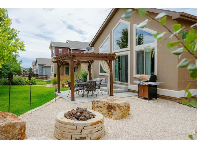 Property Photo 34 Welcome to your Outdoor Oasis! Gas Firepit with Tiki Torches Perfect for a Summer Evening!