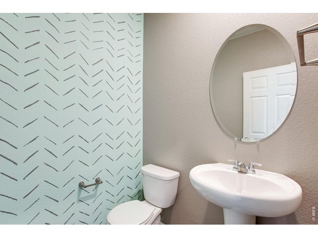 Property Photo 21 Powder bathroom on main level