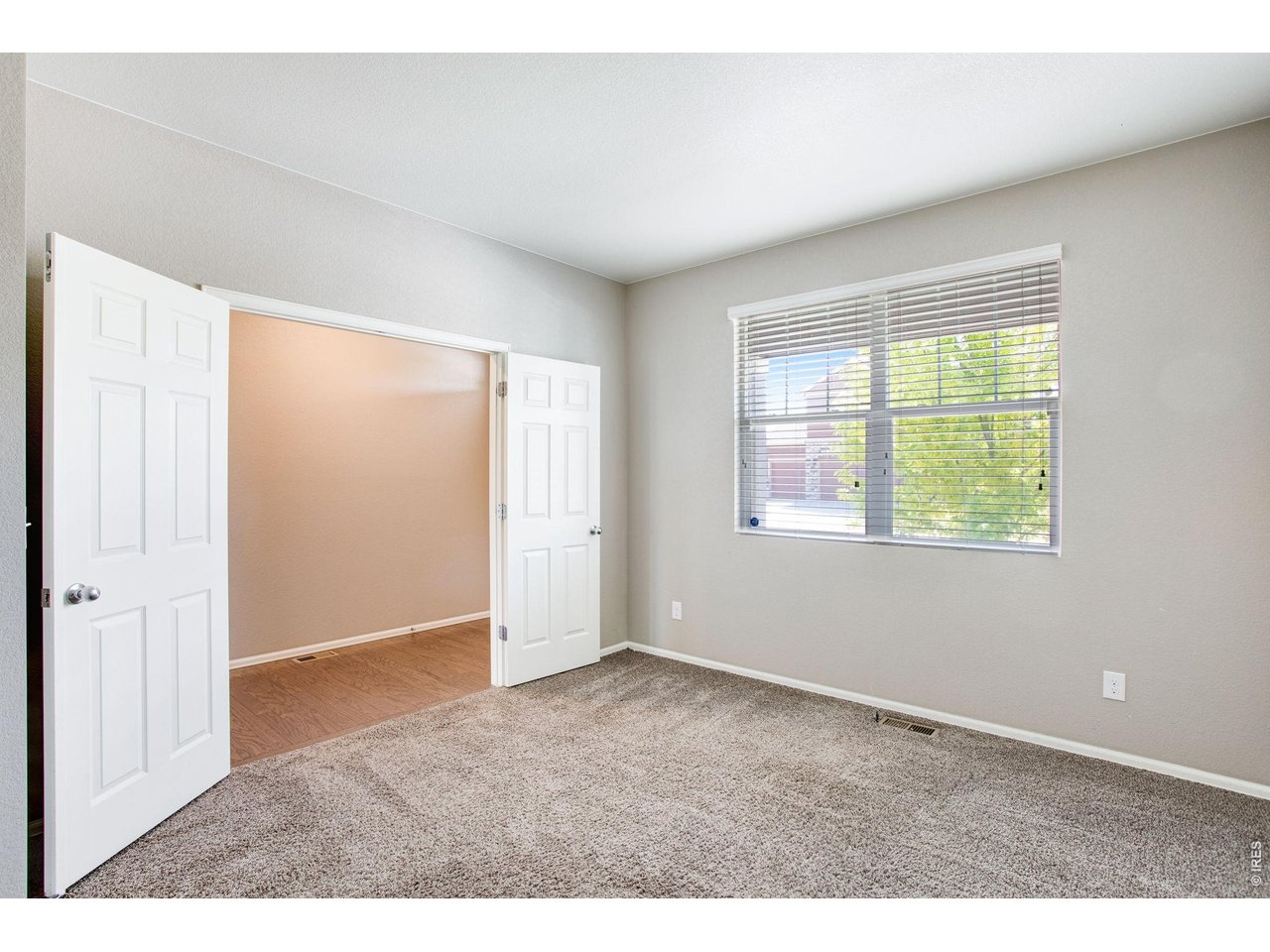 Property Photo 25 French doors open to office