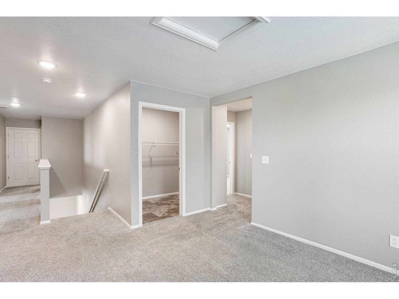 Property Photo 26 Rec/bonus room at top of stairs on second level