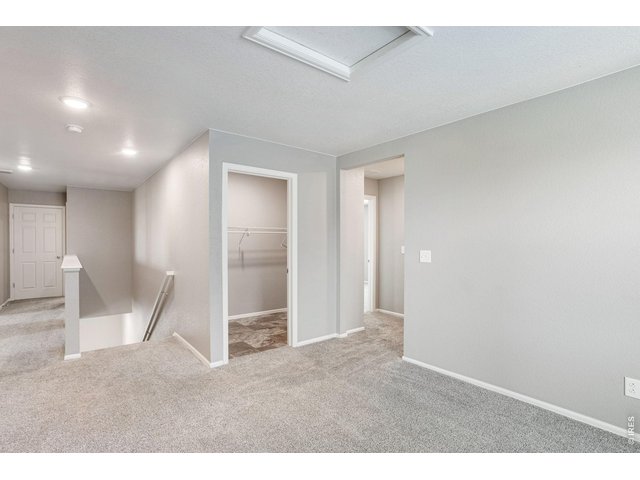 Property Photo 26 Rec/bonus room at top of stairs on second level