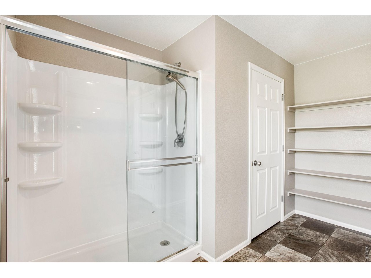 Property Photo 33 Stand up shower in primary bathroom