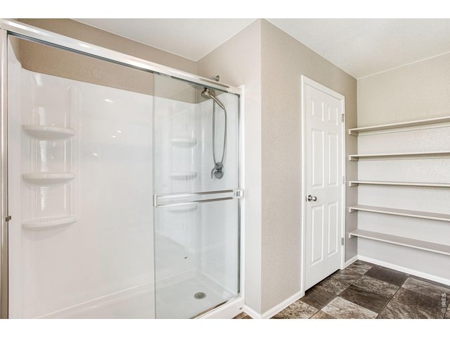 Property Photo 33 Stand up shower in primary bathroom
