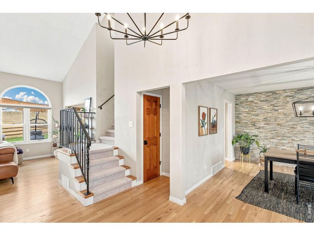 Property Photo 4 Beautiful wood floors throughout the main level.