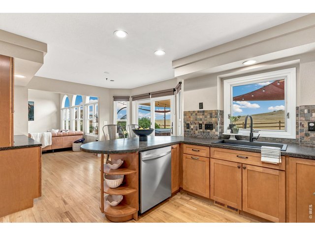 Property Photo 19 Kitchen opens to family room. (13' x 11')
