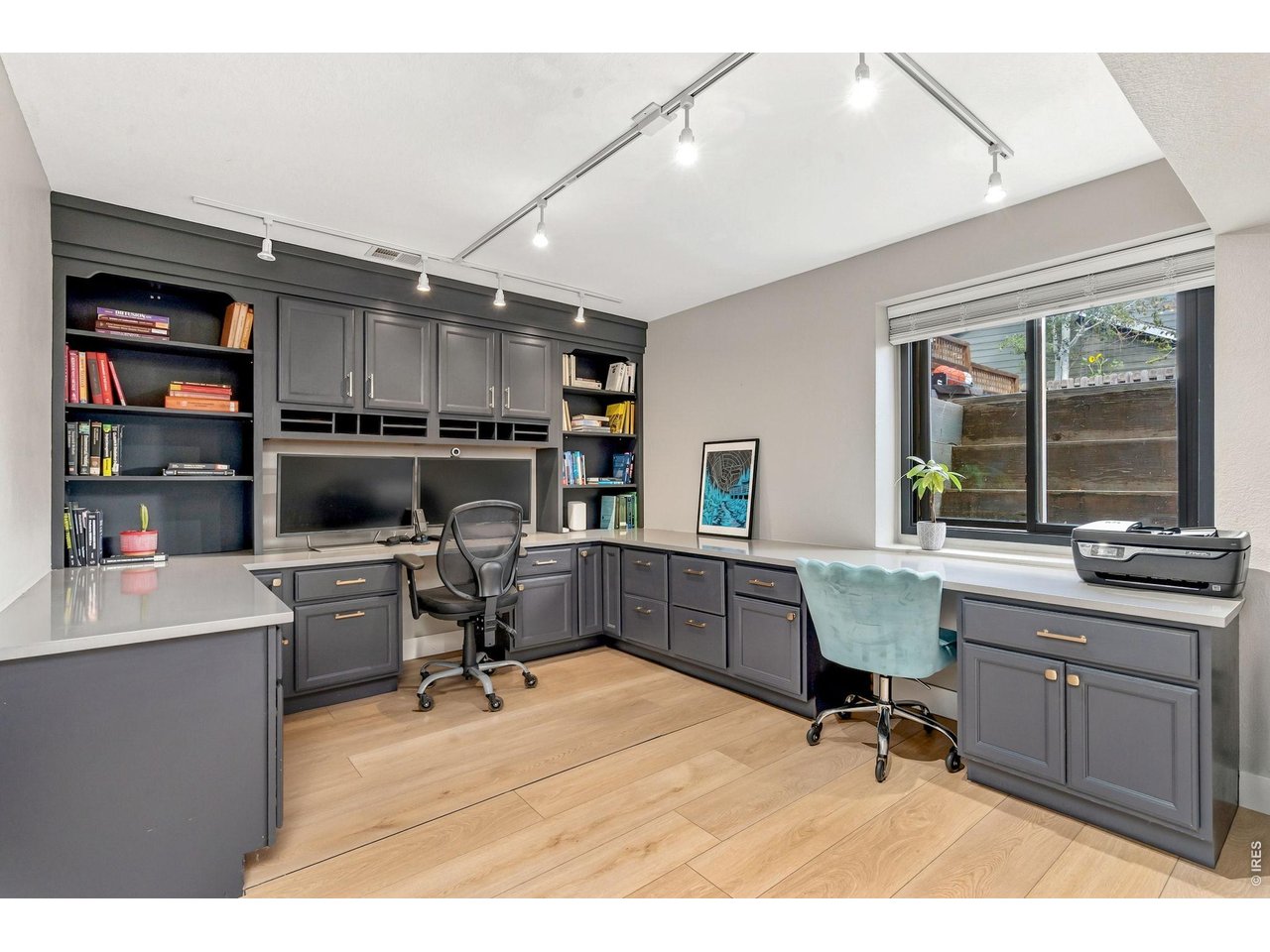 Property Photo 36 5th Bedroom/Office in basement with quartz countertops. (15' x 11')