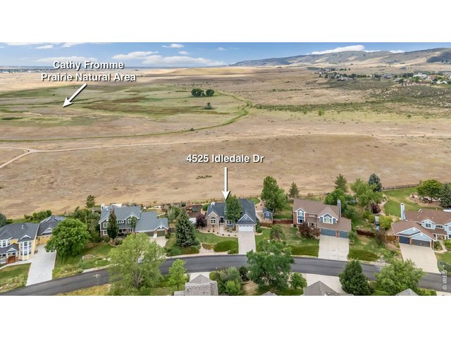 Property Photo 48 Looking south with miles of open space into Cathy Fromme Prairie that is protected land that will never be developed.