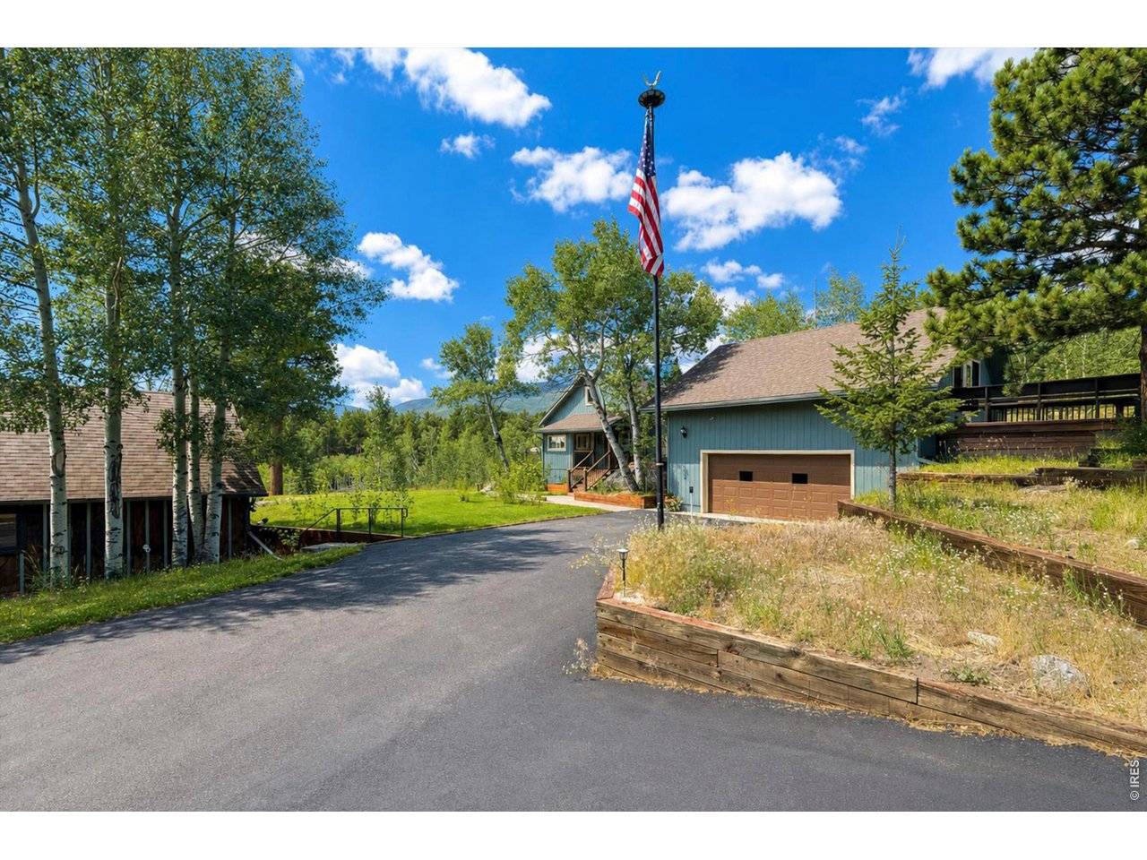 Property Photo 39 Paved driveway with forestry barn steps from the house for the ultimate conveneince