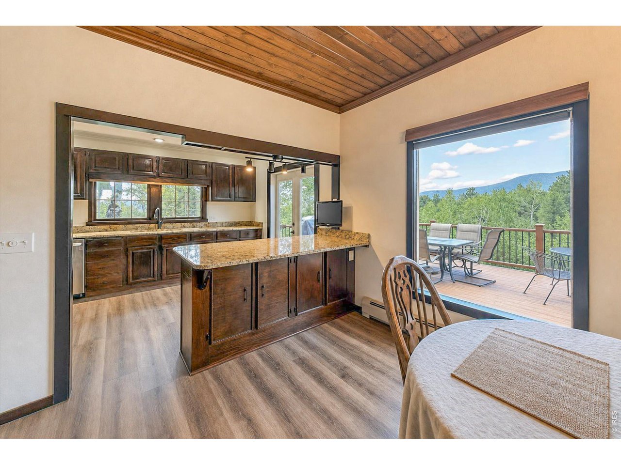 Property Photo 13 From dining room out that gorgeous picture window and towards the kitchen