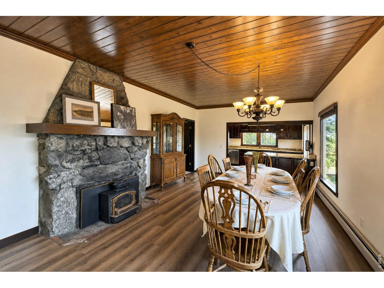 Property Photo 16 original stone fireplace with woodstove added