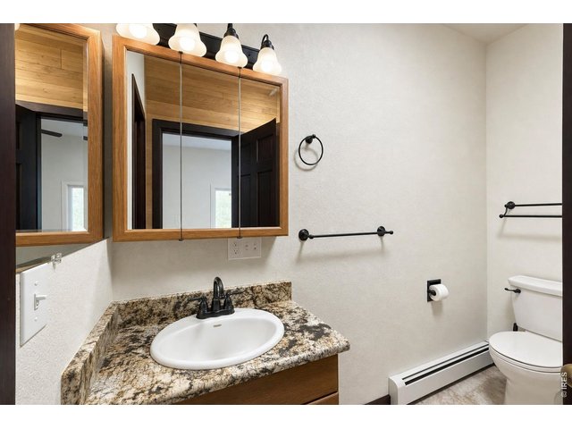 Property Photo 23 full bath off of front bedroom and laundry room
