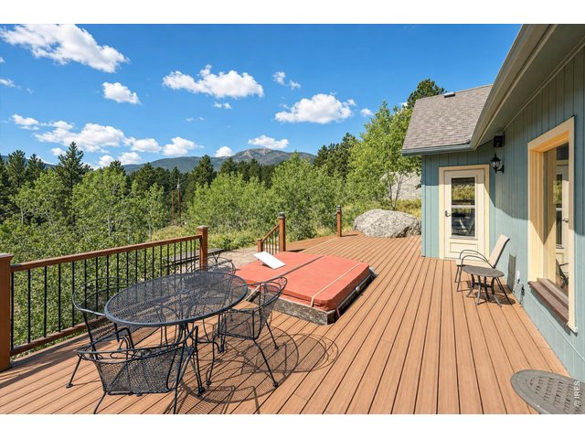 Property Photo 10 400 sq ft deck with hot tub