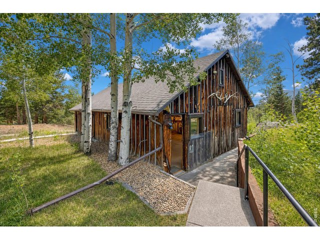 Property Photo 41 Front half entrance to forestry barn with original building!