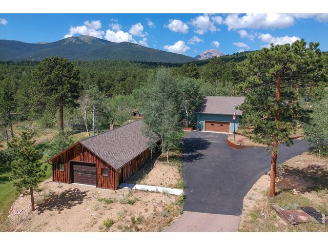 Property Photo 45 Forest barn south entrance, paved driveway convergence and attached two car garage. Oh, and those gorgeous mountain views!
