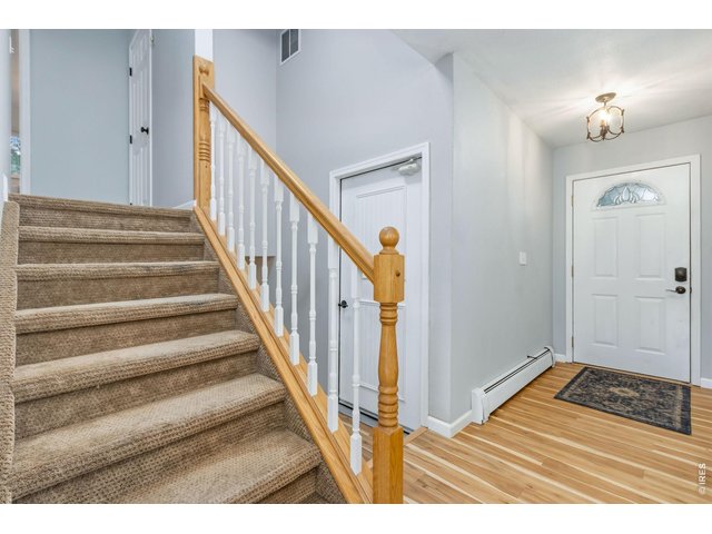 Property Photo 22 Welcoming entryway with convenient coat closet.