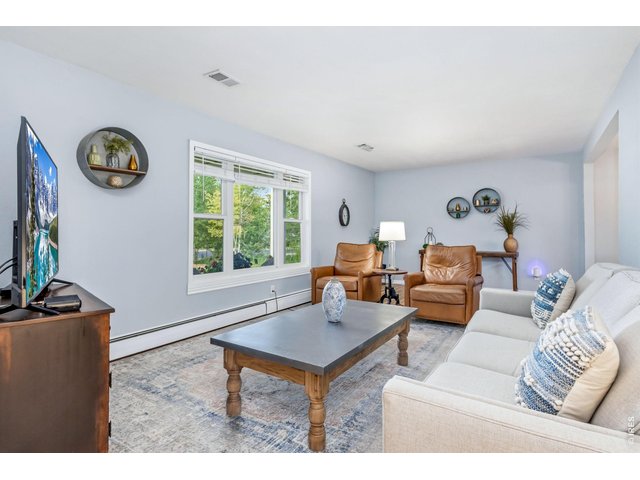 Property Photo 8 Bright, open spaces create a warm and welcoming atmosphere.