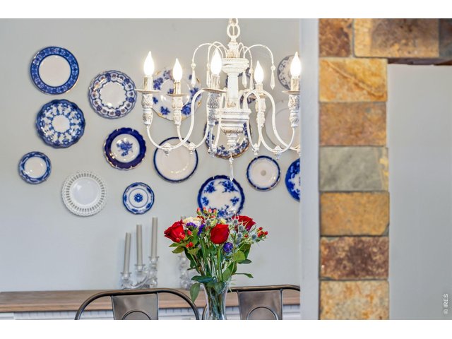 Property Photo 12 Designer chandelier adds elegance and character.