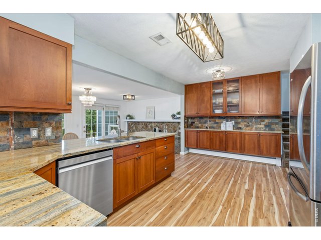 Property Photo 14 Beautiful kitchen featuring granite countertops.
