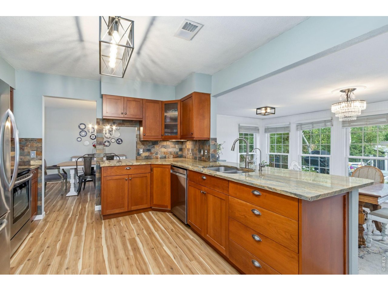 Property Photo 16 Functional kitchen designed for both cooking and entertaining.