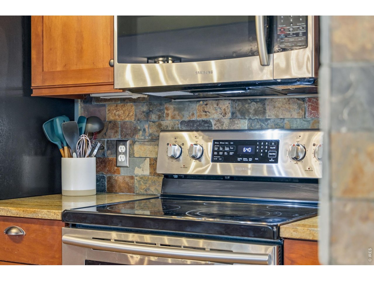 Property Photo 17 Stainless steel appliances complement the timeless finishes.