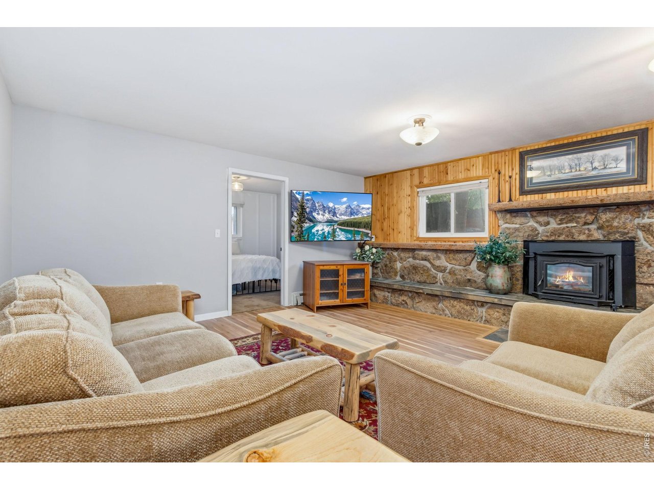 Property Photo 23 Functional lower-level living space ideal for relaxing or entertaining.