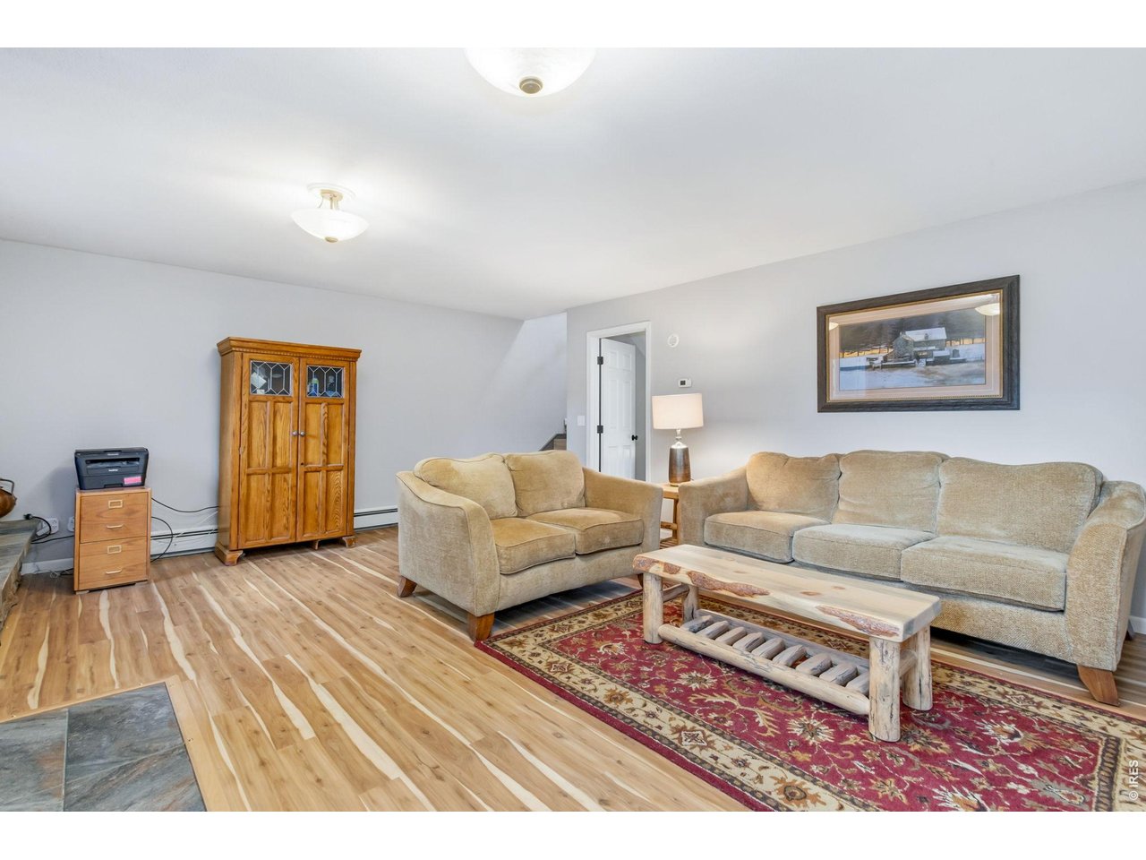 Property Photo 26 Lower level with new luxury vinyl plank flooring.