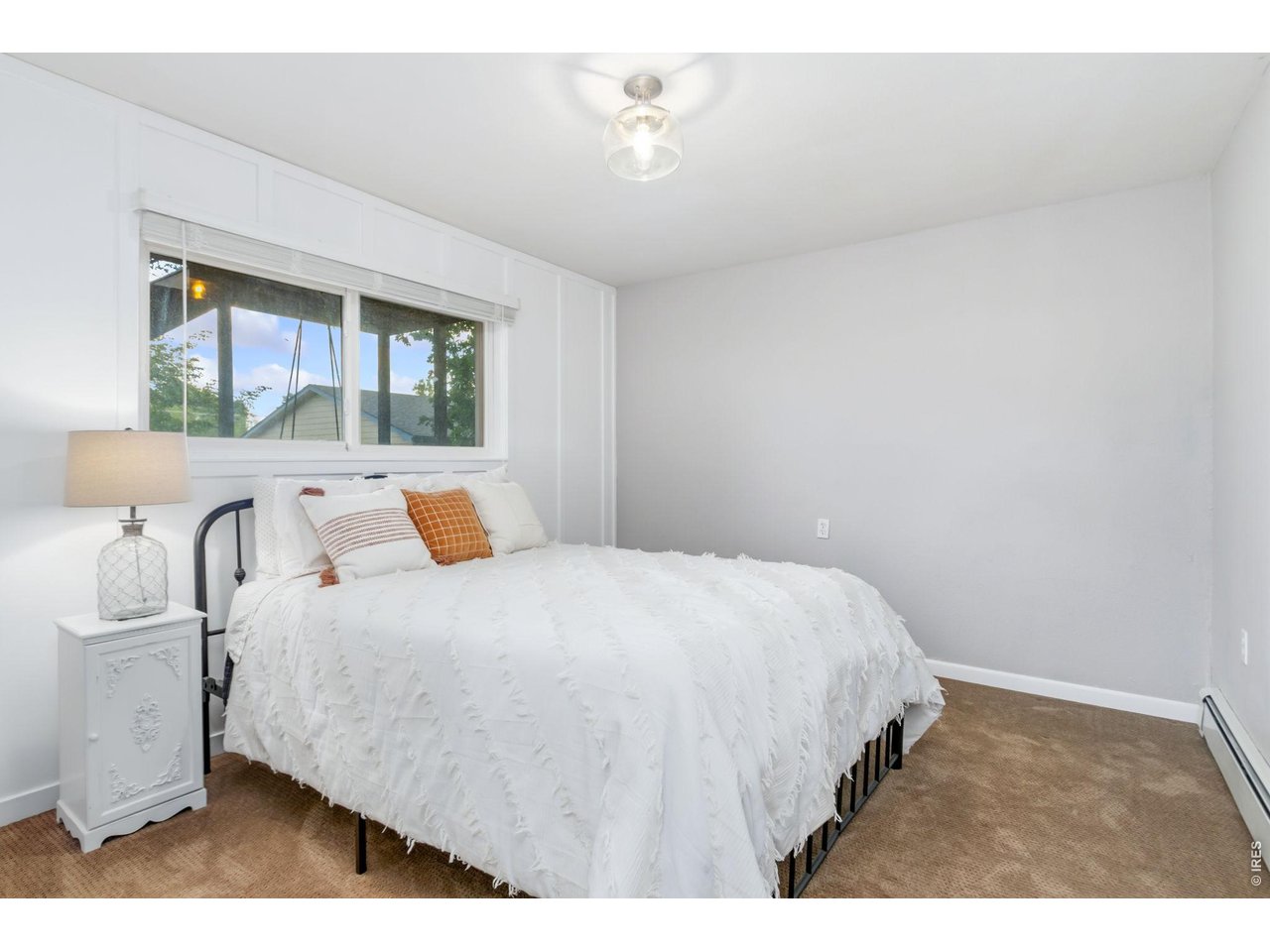 Property Photo 27 Fourth bedroom offers flexibility for guests or multi-generational living.