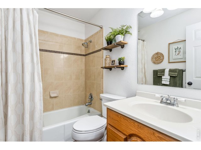 Property Photo 38 Shared full bathroom conveniently serves both secondary bedrooms.