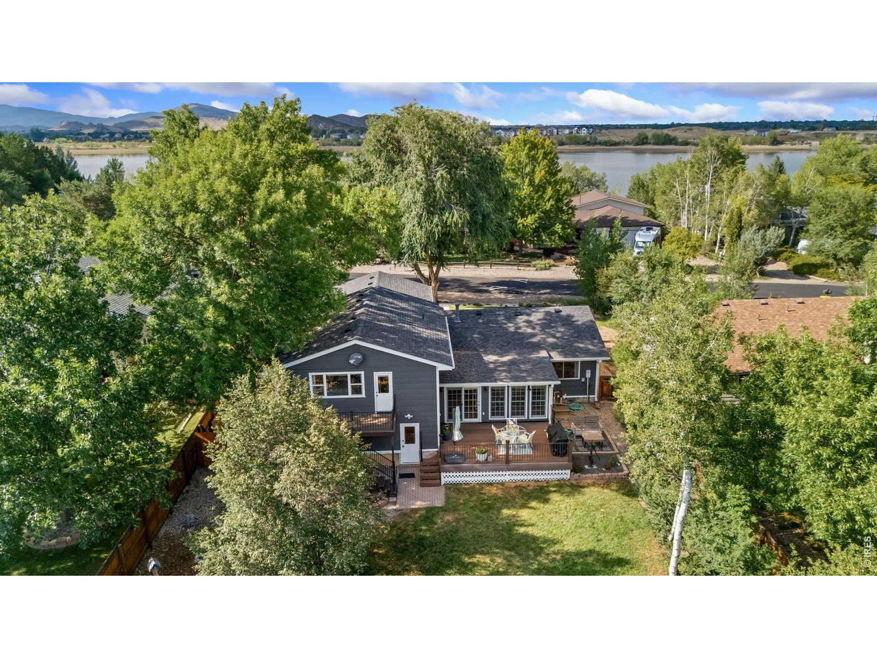 Property Photo 1 Welcome to 4212 Redbird Place, ideally located across from beautiful Boedecker Lake.