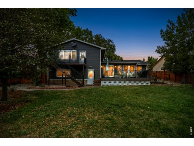 Property Photo 44 Situated on an expansive 1/3-acre lot with mature landscaping and inviting curb appeal.