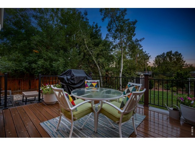 Property Photo 47 Large deck creates the perfect setting for outdoor dining and entertaining.