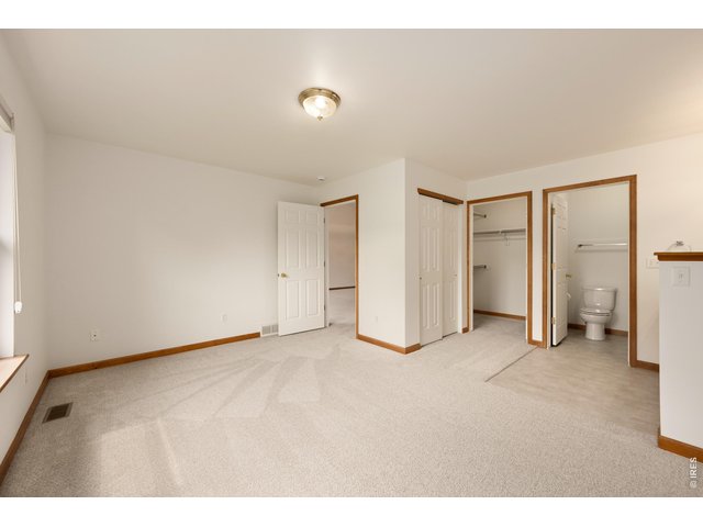 Property Photo 13 New Carpet. His & Her Closets. Large Primary Bedroom