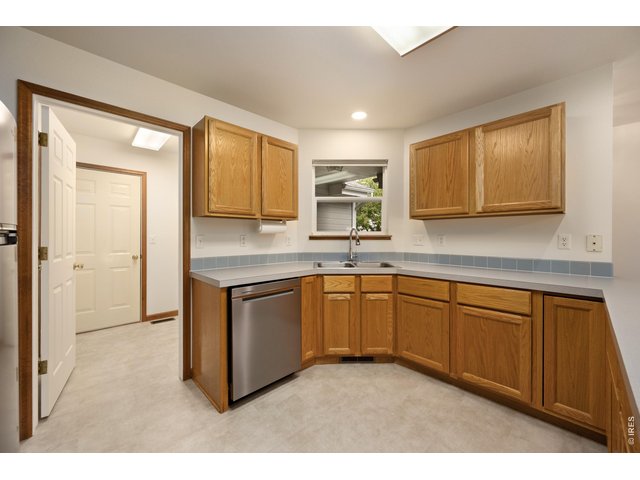 Property Photo 9 New Luxury Vinyl Flooring in Kitchen!