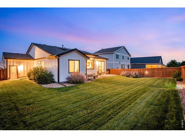 Property Photo 15 Beautiful perennials, lush & comfortable yard ready for enjoyment or just peace of mind.