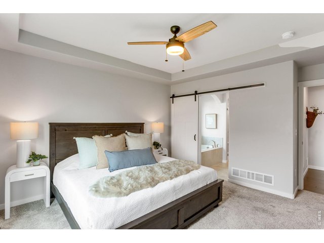 Property Photo 21 sliding barn door -comfortable primary suite!