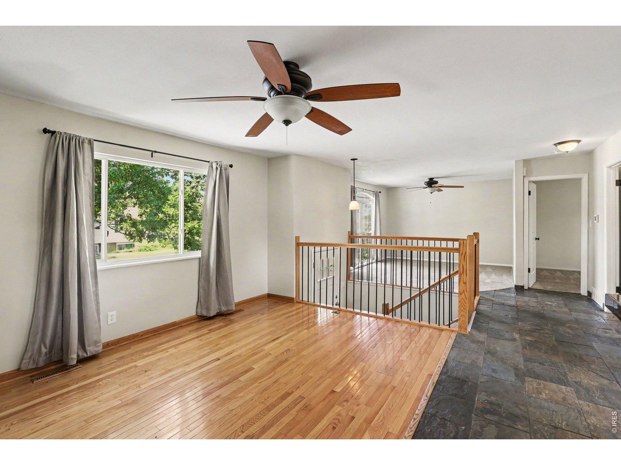 Property Photo 2 Spacious open floor plan with wood flooring