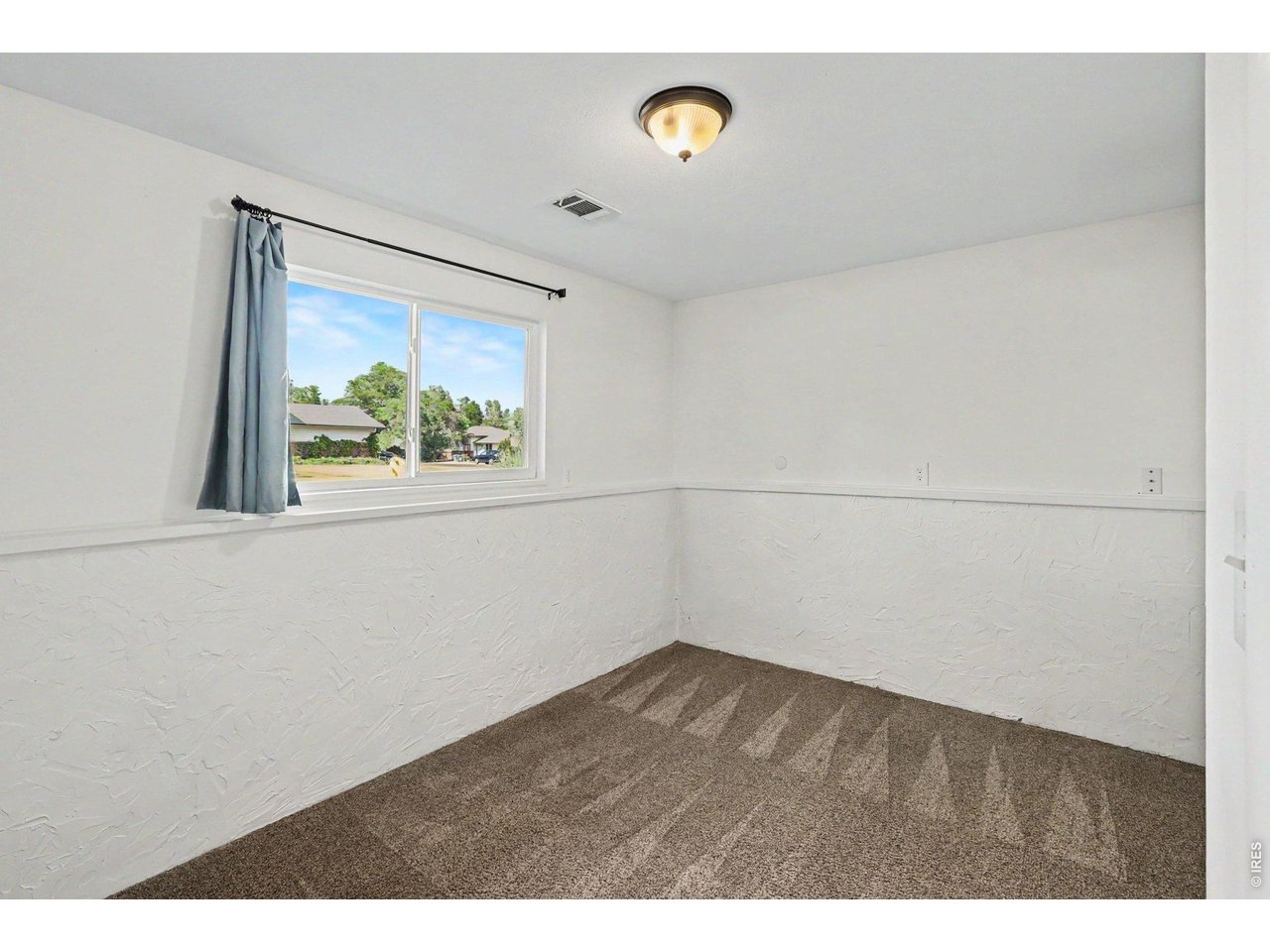 Property Photo 12 Lower level 3rd bedroom