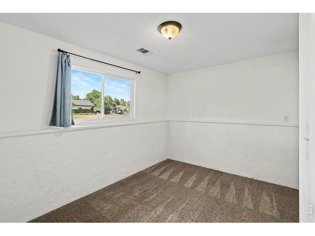 Property Photo 12 Lower level 3rd bedroom