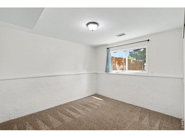 Property Photo 11 Lower level 2nd bedroom
