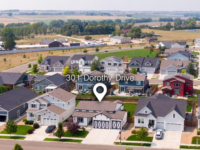 Property Photo 3 301 Dorothy Drive offers (3,155 total sq ft) with 4 bedrooms and 3 bathrooms - every bedroom featuring its own walk-in closet, a rare and welcome touch of everyday ease. Oversized living room space, nearly 1,600 sqft on the main level!