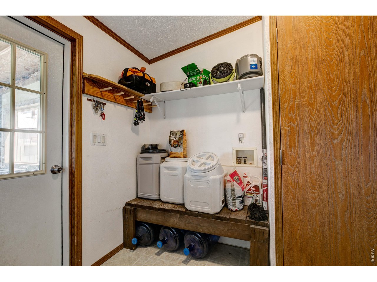 Property Photo 29 Great mud room, storage in rear of home