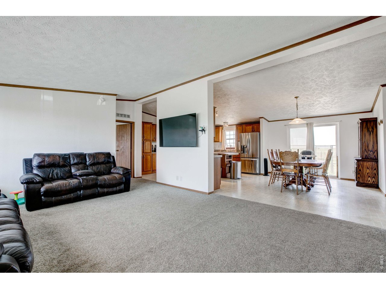 Property Photo 8 Front living room spills into large kitchen!