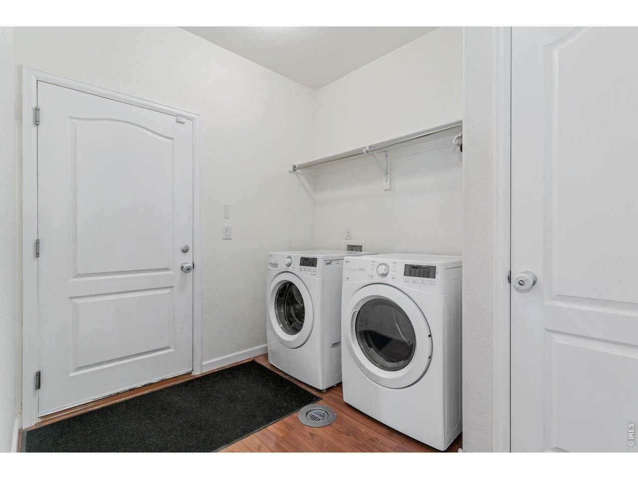Property Photo 21 The laundry room has access to the garage, as well as a closet to store cleaning items, vacuum, ect.