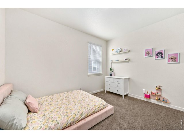 Property Photo 19 3rd Bedroom located at the front of the home.