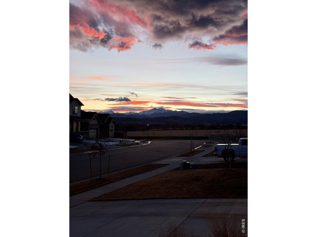 Property Photo 27 Amazing sunset views overlooking Longs Peak from your front porch.