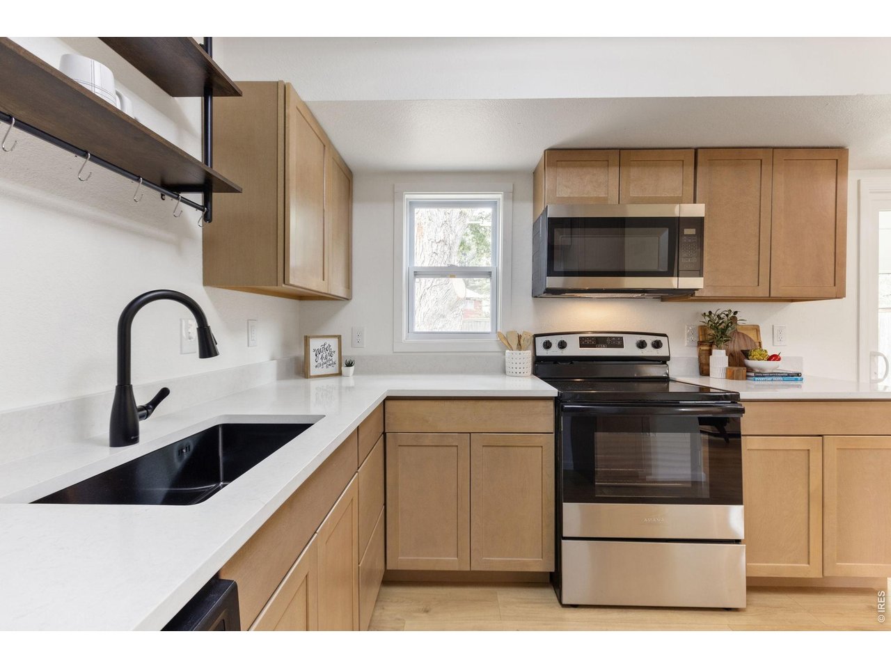 Property Photo 6 Quartz Counters, and Stainless Appliances